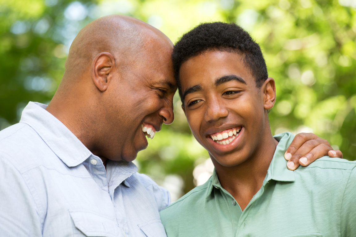 African American Father and Teen Son
